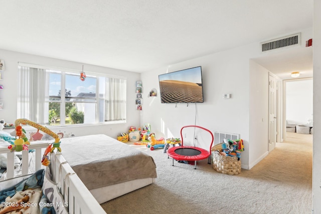 bedroom featuring carpet