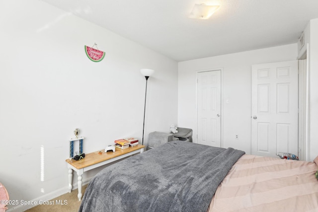 bedroom featuring carpet flooring