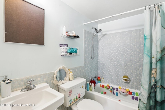 full bathroom featuring sink, toilet, and shower / bath combo