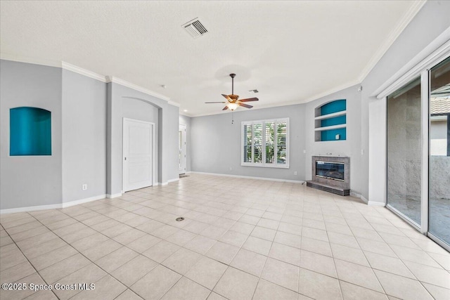 unfurnished living room featuring light tile patterned floors, crown molding, a textured ceiling, and ceiling fan