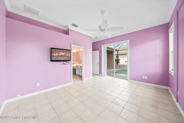 tiled spare room with ornamental molding and ceiling fan