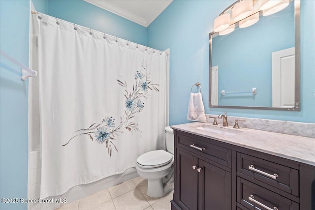 bathroom with crown molding, tile patterned floors, toilet, and vanity