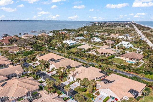 drone / aerial view featuring a water view