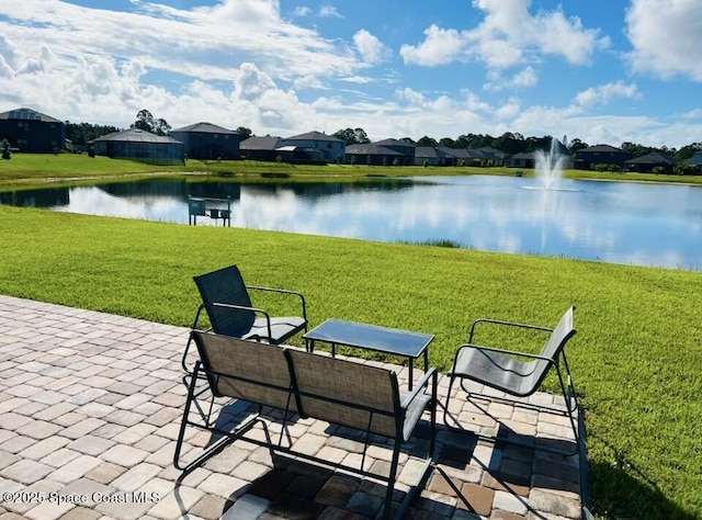 view of patio / terrace featuring a water view