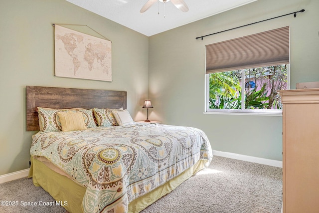 bedroom featuring ceiling fan, carpet flooring, and vaulted ceiling