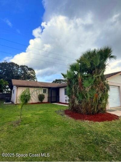 exterior space featuring a front yard