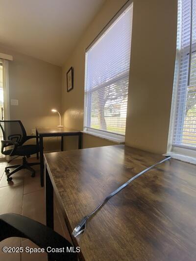 home office with vaulted ceiling