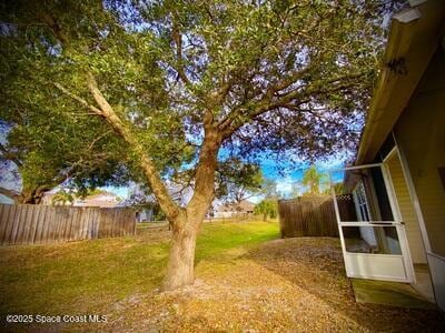 view of yard featuring fence