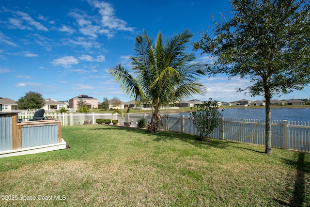 view of yard with a water view