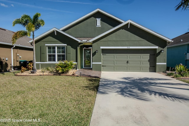 view of front of home with a garage and a front yard