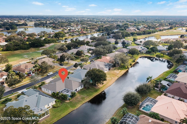 drone / aerial view featuring a water view