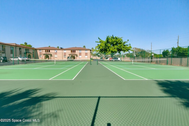 view of tennis court with basketball court