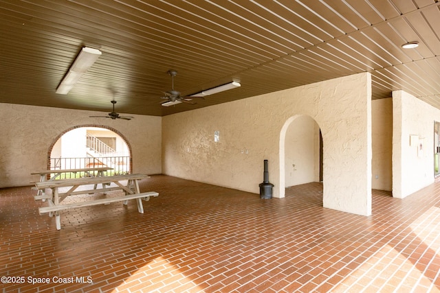 unfurnished room with ceiling fan