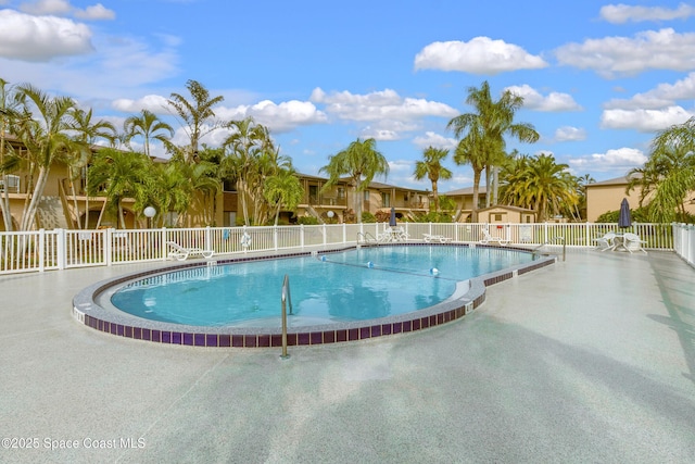 view of pool featuring a patio area