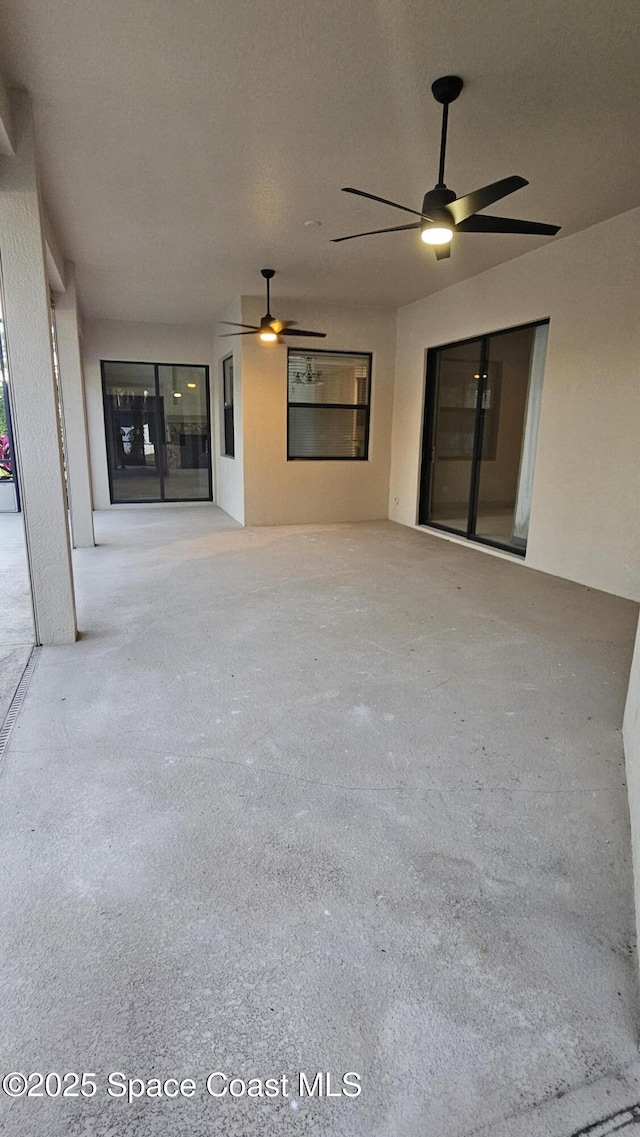 view of patio / terrace featuring ceiling fan