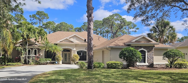 view of front of home with a front lawn