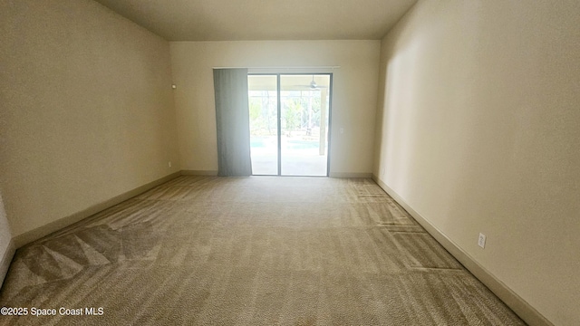 empty room with light colored carpet