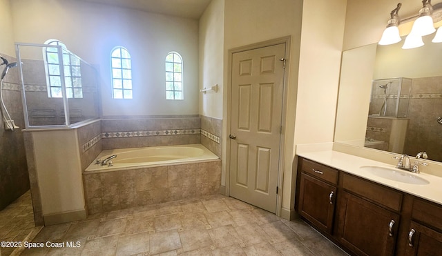 bathroom with vanity and plus walk in shower