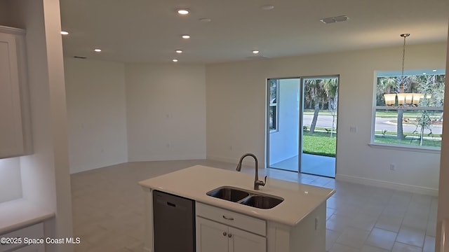 kitchen with sink, decorative light fixtures, dishwashing machine, a kitchen island with sink, and white cabinets