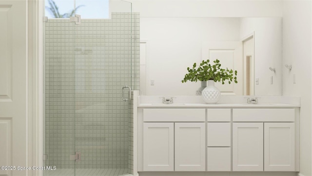 bathroom featuring vanity and a shower with shower door