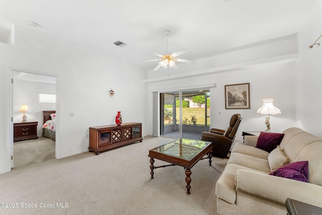 926 Pine Creek Cir NE, Palm Bay, FL 32905 - carpeted living area featuring a ceiling fan