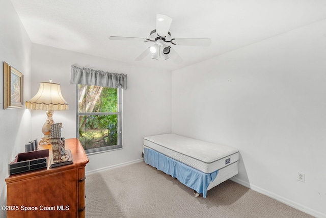926 Pine Creek Cir NE, Palm Bay, FL 32905 - carpeted bedroom featuring baseboards and a ceiling fan