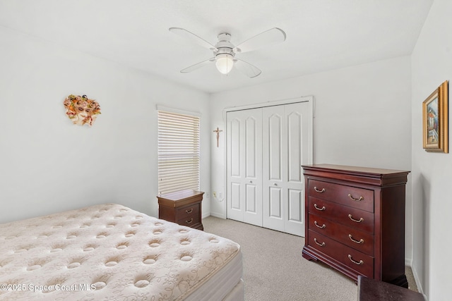 926 Pine Creek Cir NE, Palm Bay, FL 32905 - bedroom featuring light carpet, a closet, and a ceiling fan