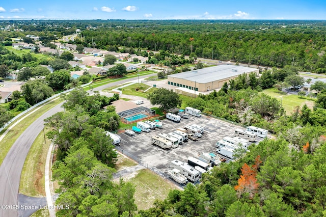 926 Pine Creek Cir NE, Palm Bay, FL 32905 - drone / aerial view of a heavily wooded area