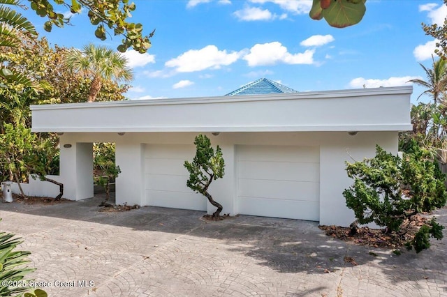 garage with a carport