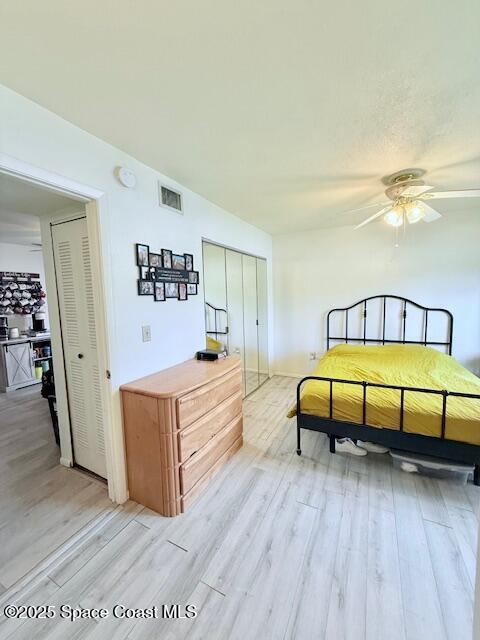 bedroom with light hardwood / wood-style flooring