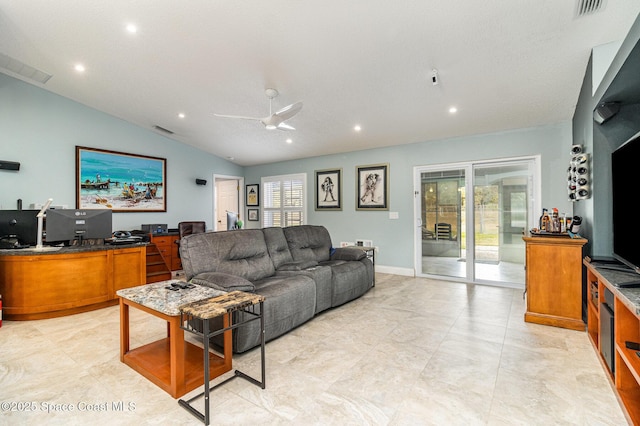 living room with vaulted ceiling and ceiling fan