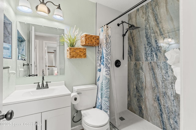 bathroom with a shower with curtain, vanity, and toilet