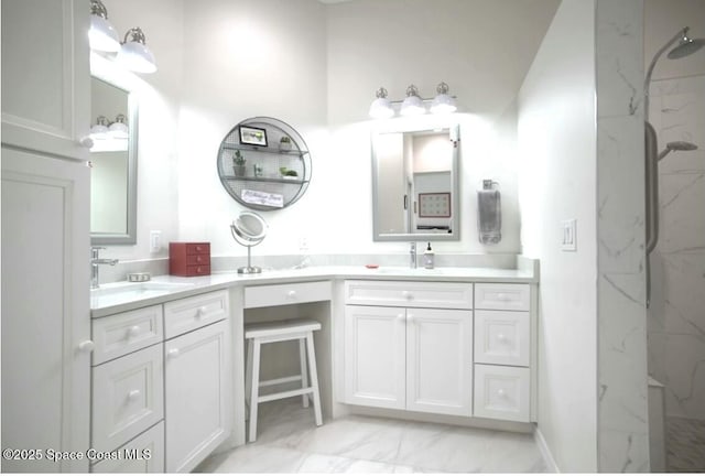 bathroom featuring vanity and a tile shower