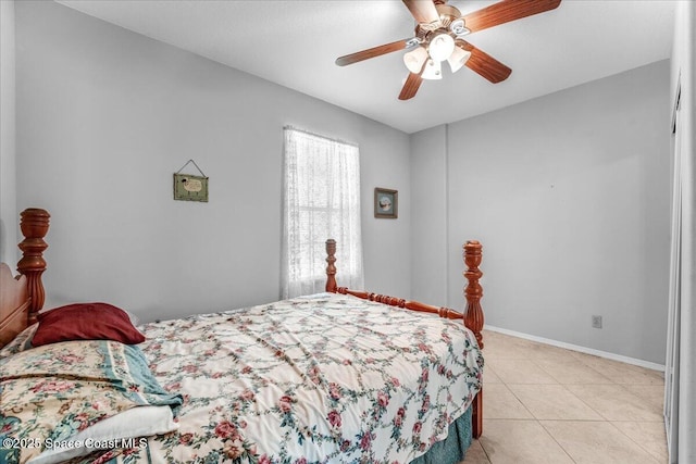 bedroom featuring light tile patterned floors and ceiling fan