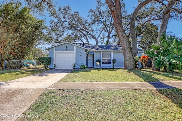 ranch-style home featuring a garage and a front lawn