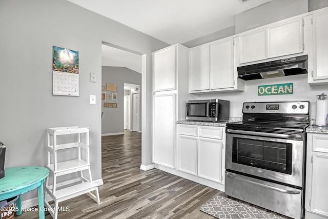 kitchen featuring appliances with stainless steel finishes, hardwood / wood-style floors, and white cabinets