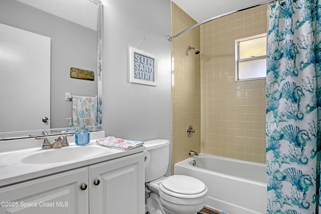 full bathroom featuring vanity, toilet, and shower / bathtub combination with curtain