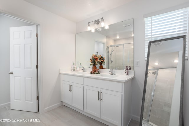 bathroom with vanity and walk in shower