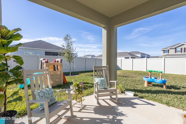 view of patio featuring a playground