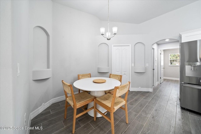 dining area with a chandelier