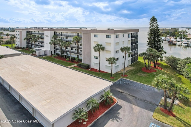 view of building exterior featuring a water view