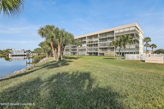 exterior space with a water view