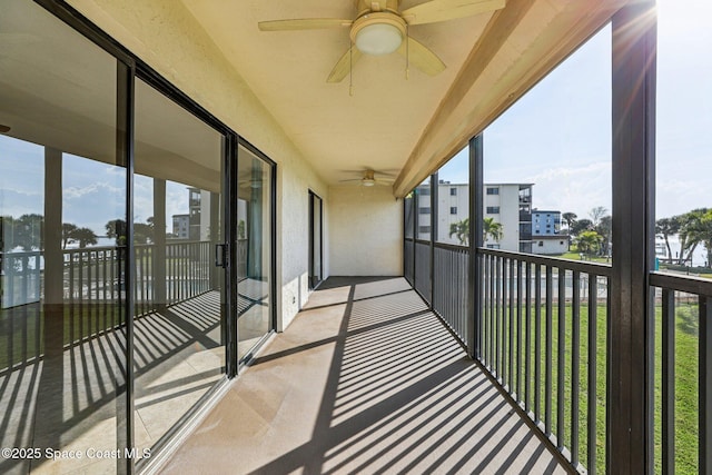 balcony featuring ceiling fan