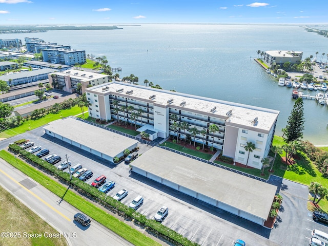 drone / aerial view with a water view