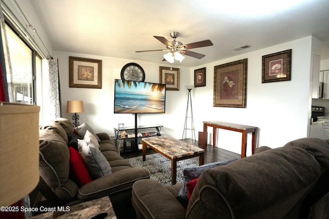 living room featuring ceiling fan