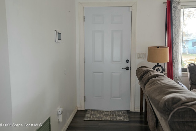 doorway featuring dark hardwood / wood-style flooring