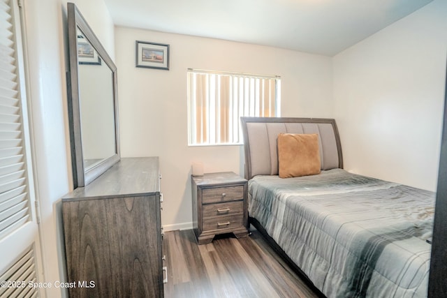 bedroom with wood-type flooring