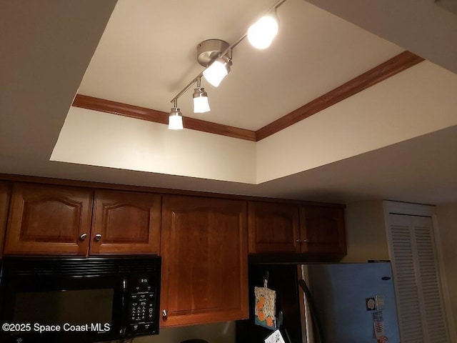 kitchen featuring stainless steel fridge