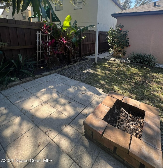 view of patio / terrace with fence