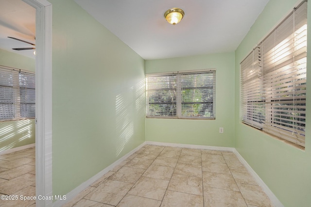 empty room featuring ceiling fan